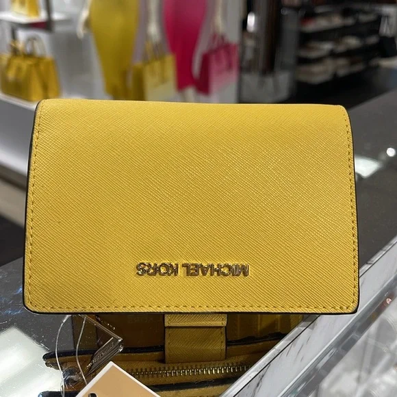 Michael Medium Crossgrain Leather Bifold Wallet
Daisy Yellow 
NWT - Picture 8 of 16